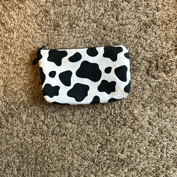 Amazon Handbags - Cow print makeup bag